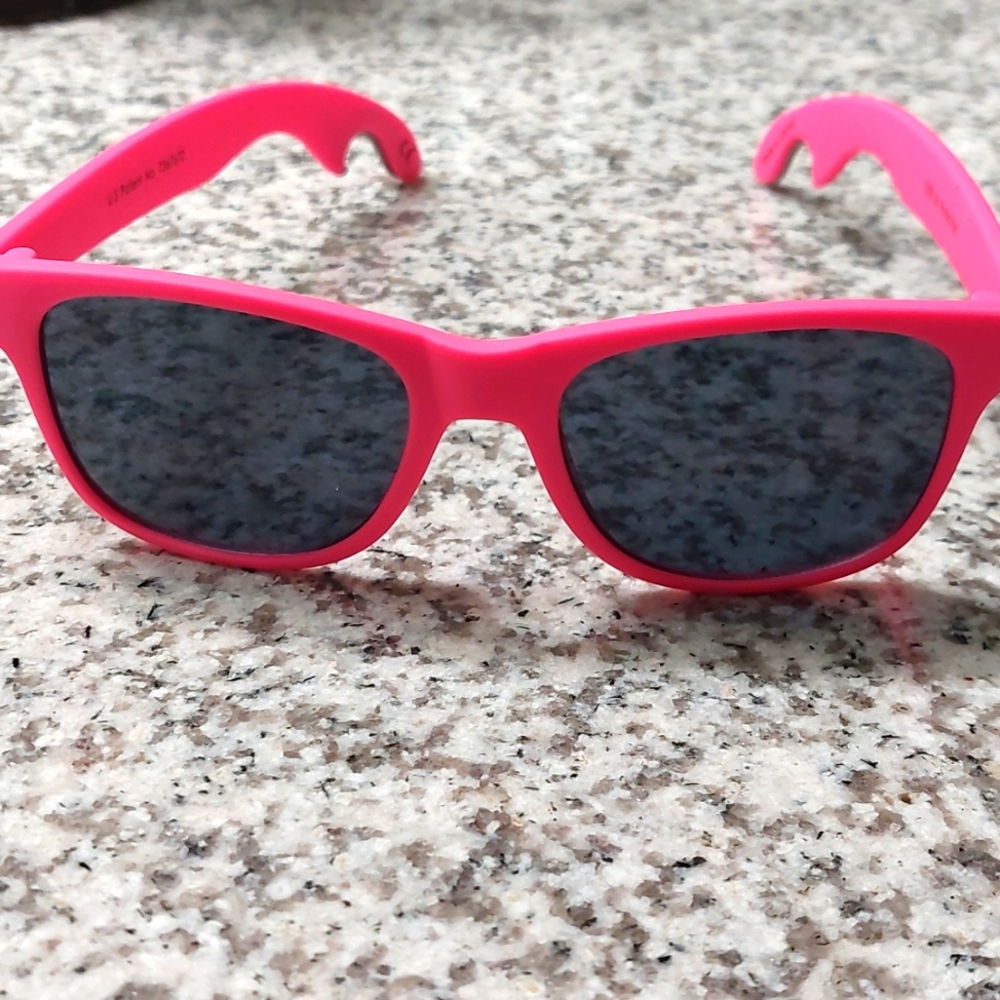 Pink sunglasses with bottle openers